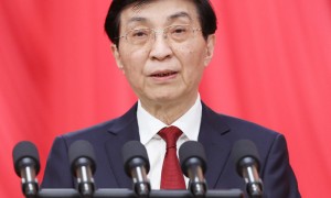 全国政协主席王沪宁代表政协第十四届全国委员会常务委员会作工作报告